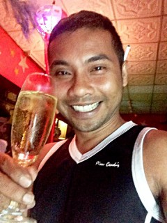 A smiling Khun Mai at Orion Bar