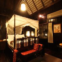 traditional lanna style bedroom at club one seven guesthouse